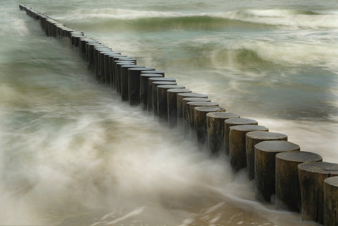 Sea Waves Wooden Posts wallpaper